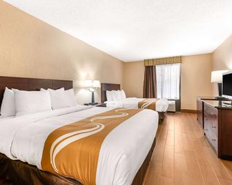 Quality Inn and Suites Orlando Airport - Orlando - Schlafzimmer