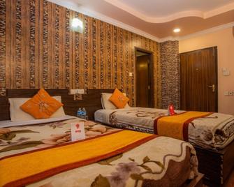 OYO 11457 Kathmandu Resort Hotel - Kathmandu - Bedroom