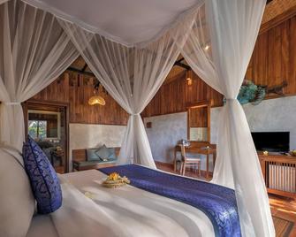 Sacred Valley by Pramana Villas - Tegalalang - Habitación