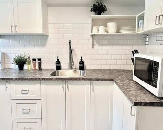 Ste-Foy urban area - 4 bedrooms - Spa - EV chrger - Ciutat de Quebec - Cuina