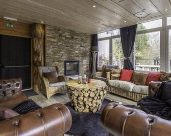 Beautiful waterfront house with heated indoor pool, sauna, terrace. - Stoumont - Living room