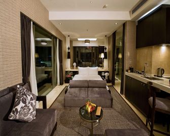 Le Parker International Hotel - סניה - חדר שינה