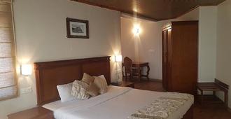 Wingait Inn - Hotel Near The Mall Road - Shimla - Bedroom