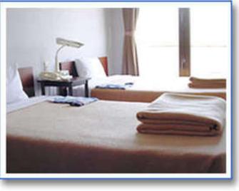 Business Hotel Sun Royal - Kameoka - Schlafzimmer