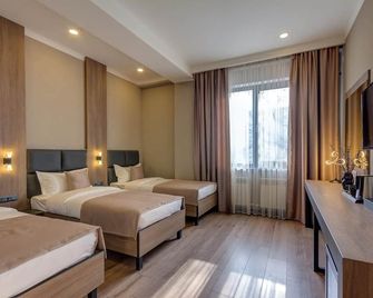 Sara Boutique Hotel - Bişkek - Yatak Odası