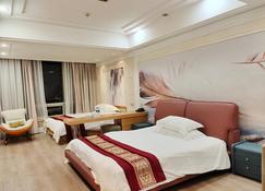 Wuxi Kaiyan Universal Center Serviced Apartment - וושי - חדר שינה