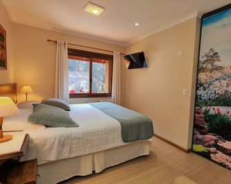 Hotel Azaleia - גרמאדו - חדר שינה
