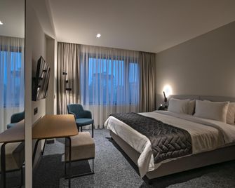 Hotel Mona Plaza - Belgrad - Schlafzimmer