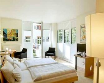 Four-bed room - Hotel Watthalden - Ettlingen - Schlafzimmer