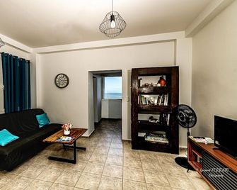 L'Heure Dorée - Meublé 3 étoiles - Vue mer - Saint-Pierre - Sala de estar