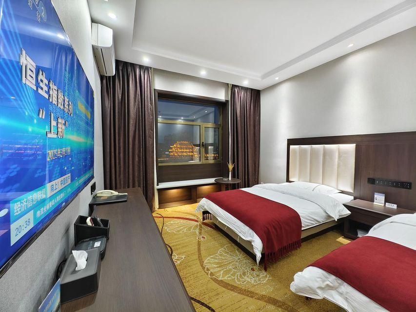 Hua Sheng Business Hotel - זי'יוצ'ואן - חדר שינה