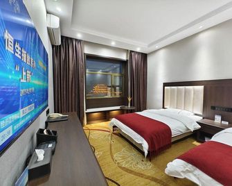 Hua Sheng Business Hotel - Jiuquan - Slaapkamer