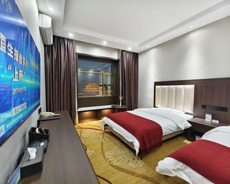 Hua Sheng Business Hotel - Jiuquan - Slaapkamer