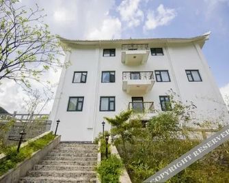 Shennongjia Xiangxiyuan Hotel - Shennongjia - Edificio
