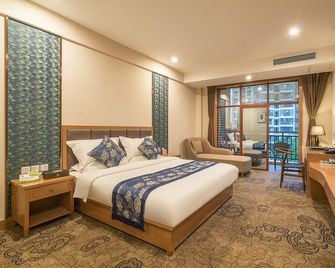 Meidu Hotel - Xishuangbanna - Schlafzimmer