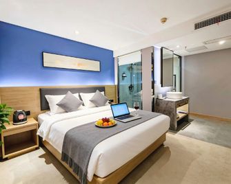 Zhenai Apple Hotel (Linyi commodity wholesale City store) - Linyi - Bedroom