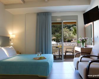 Grand Theoni Boutique Hotel & Spa - Vasiliki - Slaapkamer