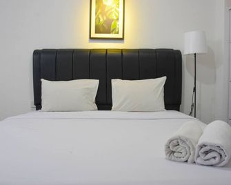 Elegant and Comfy Studio at Bassura City Apartment - Τζακάρτα - Κρεβατοκάμαρα