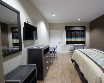 Scottish Inns And Suites 146 - בייטאון - חדר שינה