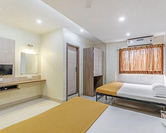 Hotel Kalpadeep - Shirdi - Спальня