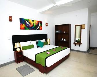 Celestial Inn - Mirissa - חדר שינה