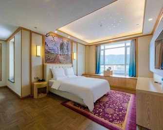 Antu Weina International Hot Spring Grand Hotel - Yanbian - Bedroom