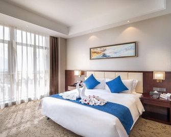 Roffar Tian Yue Gloria Plaza Hotel Xi'an - Xi'an - Slaapkamer