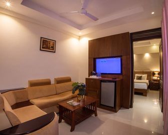 Metro Plaza Hotel By Rak Rooms, Mangaluru - Mangalore - Huiskamer