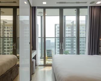 لاندمارك 81 - يونيك كوندوتيل - هوتشي مين سيتي - غرفة نوم