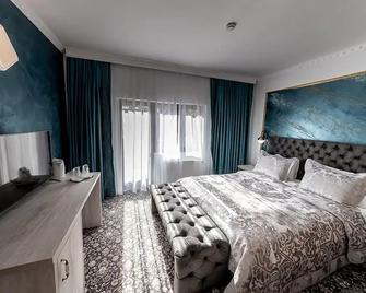 Suru Hotel & Restaurant - Busteni - Ložnice