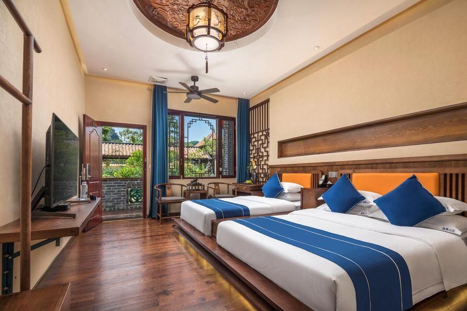 Yangshuo Ctn Cabins Retreat Hotel - גילין - חדר שינה