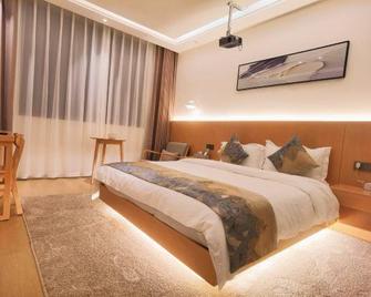 Daihong Hotel - Baoshan - Schlafzimmer