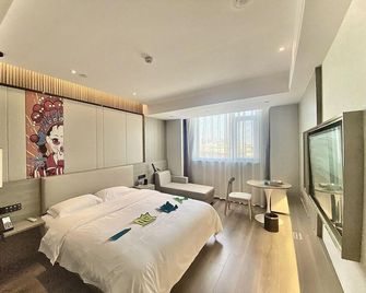 Baiya Yueting wisdom Hotel (Bozhou railway station store) - Bozhou - Спальня