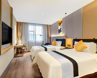 Home Inn Harbin Exhibition & Convention Centre Longta - Harbin - Habitación