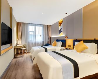 Home Inn Harbin Exhibition & Convention Centre Longta - هاربين - غرفة نوم