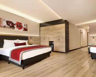 Ramada Encore by Wyndham Gebze - Gebze - Bedroom