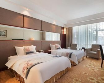Emei Mountain Hot Spring Hotel - Leshan - Bedroom