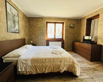 San Luigi - Rooms & Apartments - Campodolcino