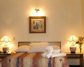 Motel Du Chevalier - גטינו - חדר שינה