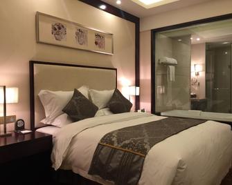 Sunwu Hot Spring International Hotel - Binzhou - Bedroom