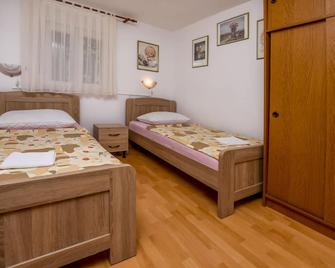 Apartments Cvitic - Rogoznica - Bedroom
