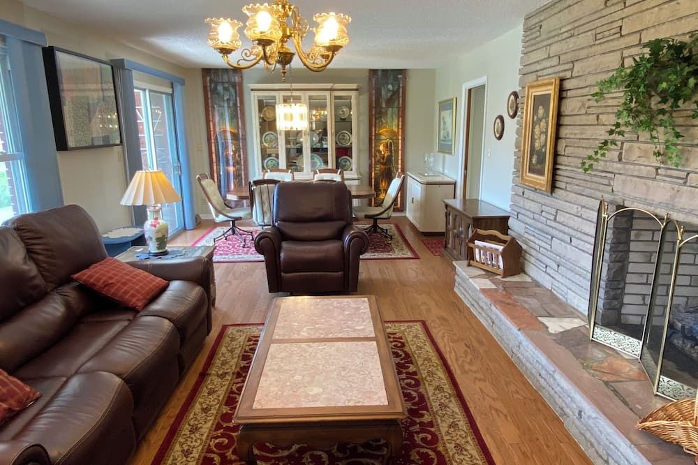 Living room view of Mins To Downtown Burnsville, Ev Level 2 Charger, Private, Wifi, Grill.