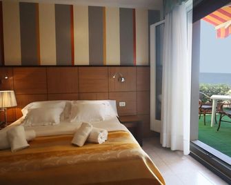 Hotel Righetto Fronte Mare - קאבאלינו טרפורטי - חדר שינה