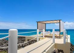 Sunset Beach View - Luxury Studio next to The Morgan Resort - Simpson Bay - Building
