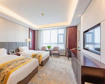 Tiandu Hotel - يونتشنغ - غرفة نوم