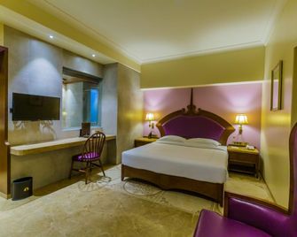 Hotel Sai Palace Mangalore - Mangalore - Bedroom