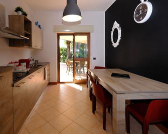 Emporium Guest House - Villaggio Mose - Restaurante