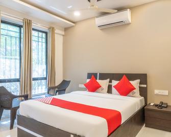 Hotel O Orchid Platinum Guest House - Pimpri - Chinchwad - Camera da letto