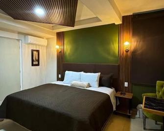 Royal Madero Inn Express - טמפיקו - חדר שינה