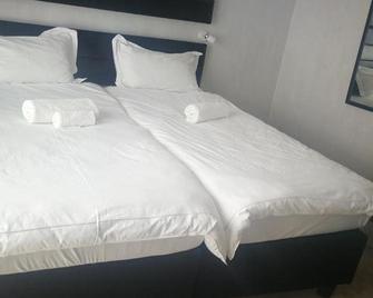 Kamho Pension Hotel - Windhoek - Ložnice